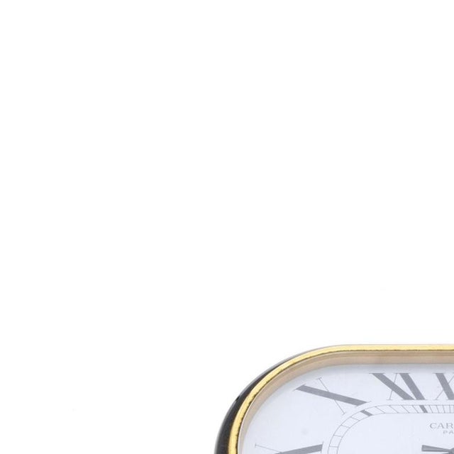 Table clock - Cartier - Accordion Desk Clock. French, 20th century; 'Accordion Desk Clock' model in gold-plated and...