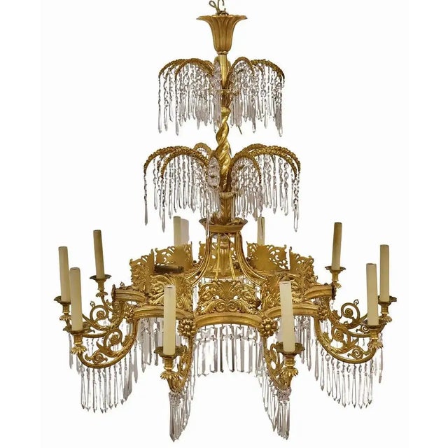 Neo-Classical Gilt Chandelier, Berlin, early 19th century. Design by Karl Friedrich Schinkel (1781-1841). Wood, tin and...