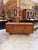 This solid teak sideboard has been completely restored while retaining a slight patina from use. It features two doors...