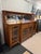 Design Plus Gallery presents an Arts & Crafts Breakfront Sideboard. The sideboard blends traditional design with refined...