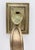 Vintage polished brass thumb latch door pull with a curved shaped handle and square plates. The original mounting screws...