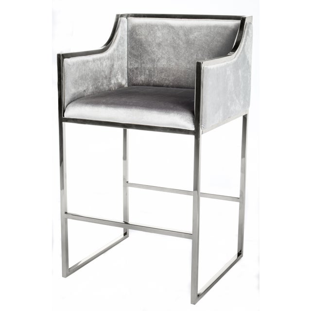 Luxe bar/counter chair will transform any room. Materials: Stainless steel, velvet Measurements : 23"w x 21"d x 39" h, 28...