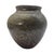 This vase holds the language of earth itself. Ochre tones rise over a base of deep brown, speckled like stone wet with...