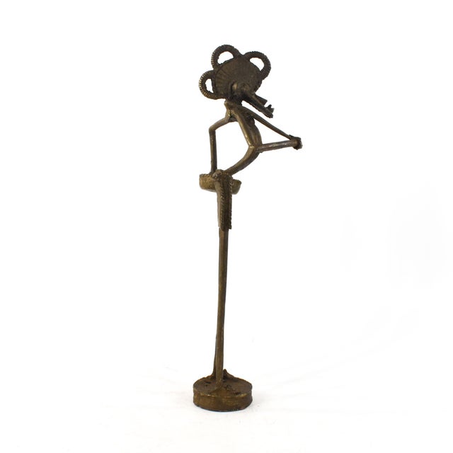 This well-modeled miniature figure comes from Mali and was made by the Dogon. The tradition of bronze cast figures is...