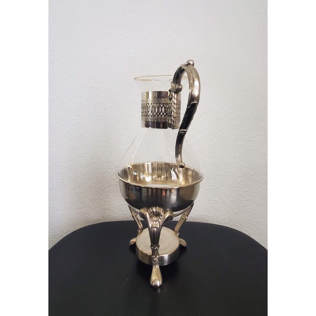Elevate your Coffee Bar with this gorgeous vintage Elegance Glass & Silver-Plated Coffee Carafe. It is crafted with an...
