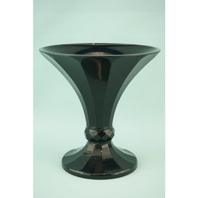 Item : A beautiful, funnel-shaped vase with a ribbed, strongly flared body, made of rather thick black opaline glass with...