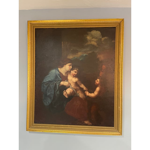 A large old master Italian oil on canvas dating from the 18th century, The work belongs to the Baroque period . The Virgin...
