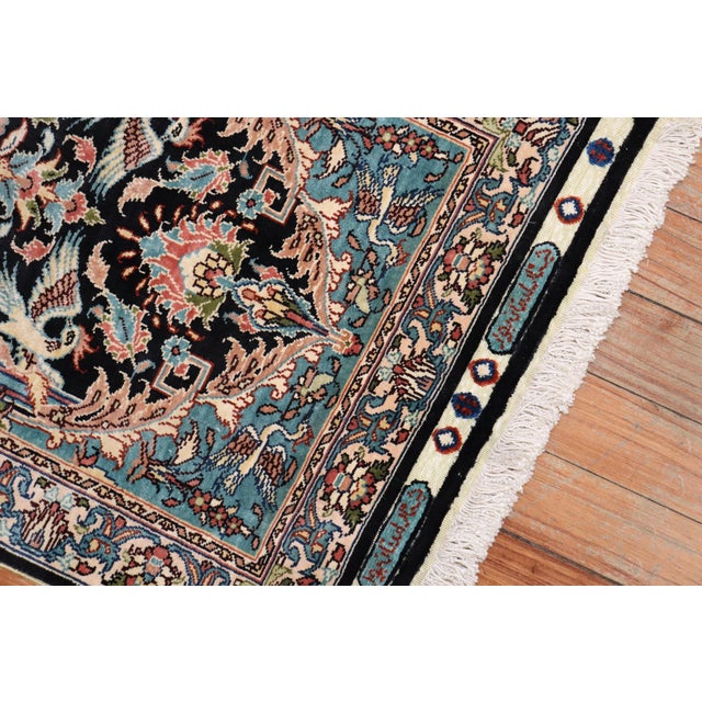 A fine collectable silk rug. Signed Keyseri.