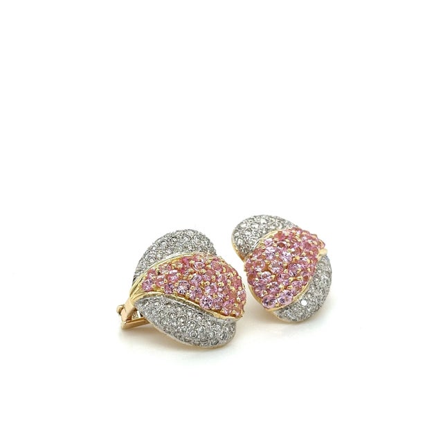 Introducing our exquisite 14K yellow gold pink and white lever back closure heart motif earring set, designed for those...