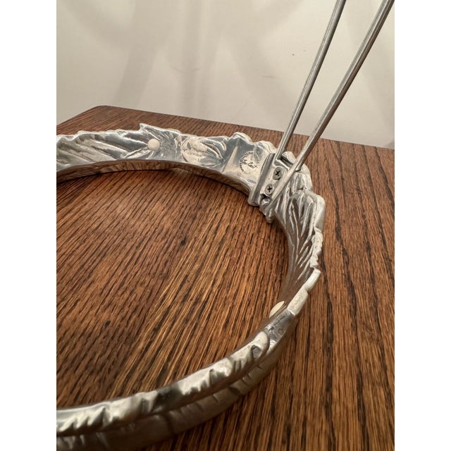 Whimsical Arthur Court cast aluminum banana holder from the Safari Collection, featuring sculptural climbing monkeys on a...