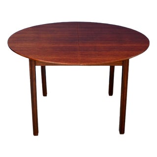 Italian Round Oval Rosewood Dining Table with Extension, 1970s For Sale