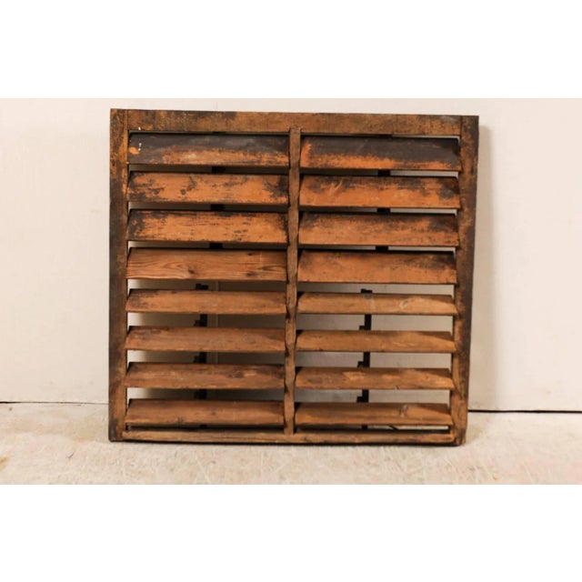 A vintage American large-size rustic wooden shutter. This vintage wooden shutter has a nice distressed look with...