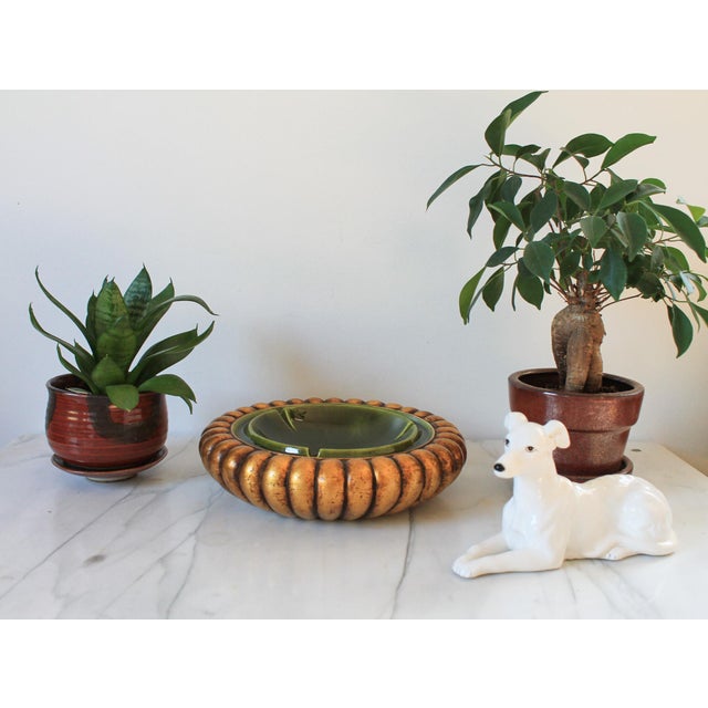 Mid-Century Anthony Freeman McFarlin California Pottery gold leaf and avocado green ashtray. Makers mark on bottom. Minor...