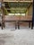 A stunning vintage console table by Harrison Van Horn featuring his signature woven grasscloth raffia finish in a rich,...