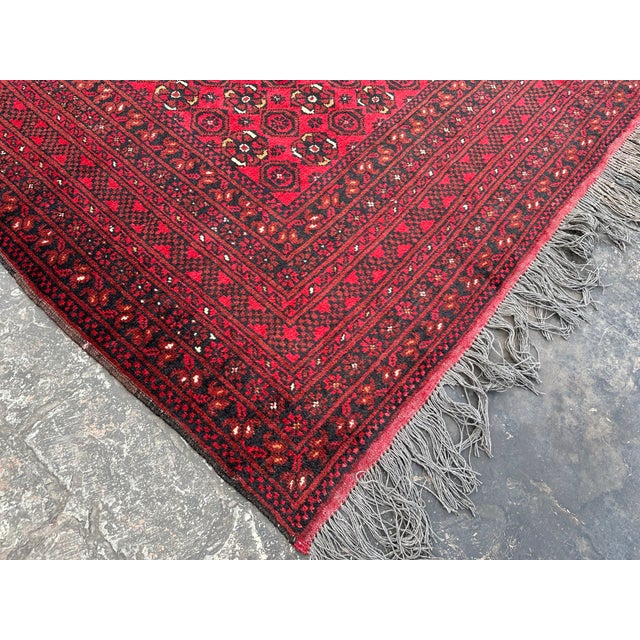 This hand-knotted Afghan rug uses natural colors and handspun wool. Bashiri Design This lovely rug will enhance your...
