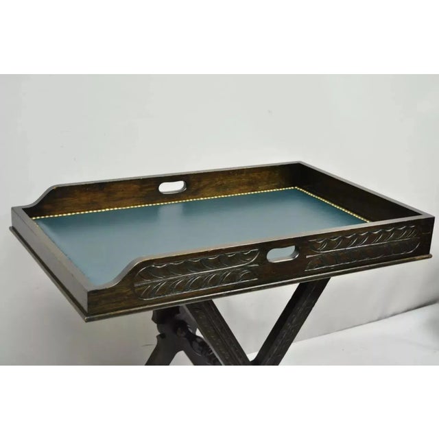 Antique Italian Renaissance Style Carved Walnut Butlers Bar Folding Tray Table with Lion Paw Feet. Item features folding...