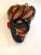A striking carved and painted mask in the tradition of the Native Indian tribes from Pacific Northwest Coast by David...
