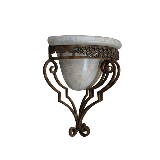 Maitland Smith illuminated wall sconce featuring a half round urn of white tessellated stone / marble, held in a gilt...