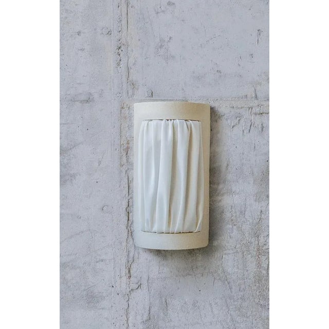 Set of 2 almond small istos wall lights by lisa allegra dimensions: d 7 x w 11.5 x h 21.5 cm (each). Materials: piece in...