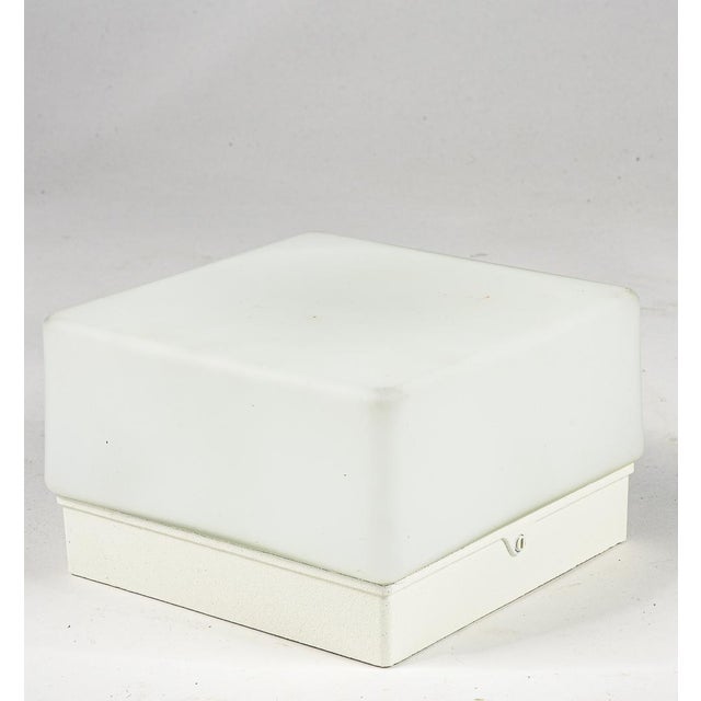 Model 5602 sconce. Vintage. White. Unused with box. Italy, 2000s. measures 16 x 16 x h 10 category: applique, modern...