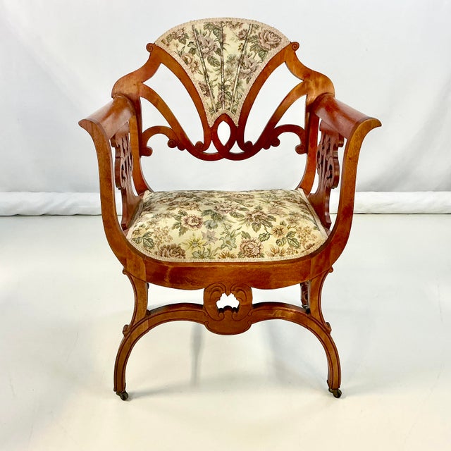 This is a stunning Italian Neoclassical Art Nouveau Curule Chair. It’s hand crafted and features detailed cut outs that...
