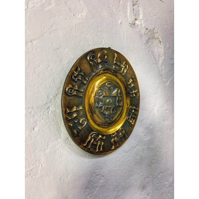 Brass wall decor plate with relief decoration, artwork of an unknown artist from 1960's / 1970's.