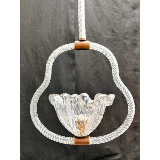 Single-light chandelier in blown and plate-worked murano glass. Made in murano in the 1940s. An e27 socket suitable for...