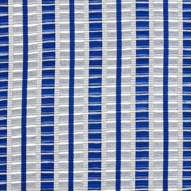 This tactile stripe boasts incredible dimension thanks to a traditional ruched weaving technique produced by master Maya...