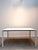 Elegant and highly functional extendable dining table by Kristalia, featuring a minimalist Italian design with a white...