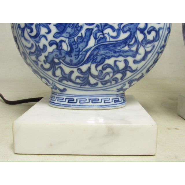 Chinese Pair of Chinese Blue and White Porcelain Moon Flask Shaped Lamps For Sale - Image 3 of 15