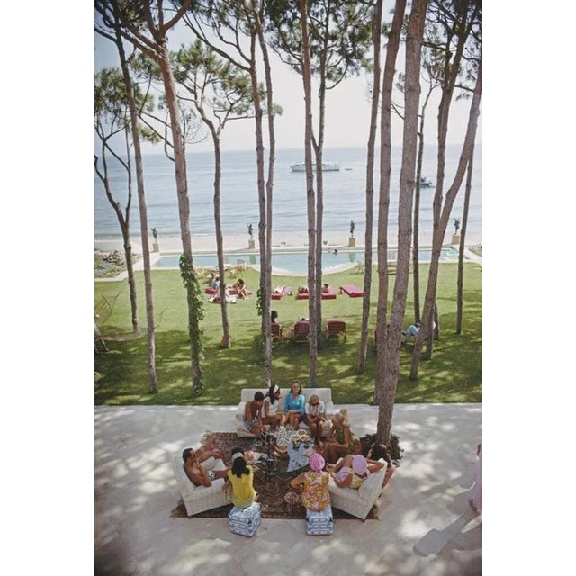 Marbella House Party 1967 by Slim Aarons Slim Aarons Limited Estate Edition Guests at a party at the home of Sebastiano...