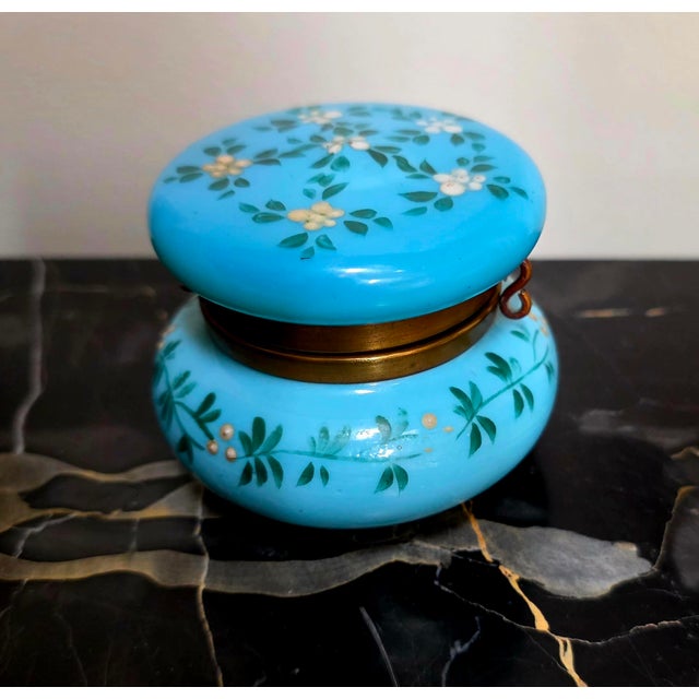 This item is an antique Victorian vanity powder jar, specifically identified as a Bohemian or French opaline glass...