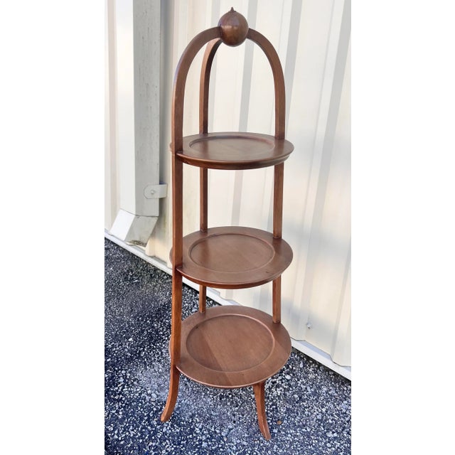 Exceptional craftsmanship. Three tiered graduated wooden dumbwaiter hand crafted around year 1900. easily holds pastries,...