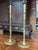 Pair of tall Georgian brass candlestick holders, crafted in the 19th Century. Beautifully aged with a smooth patina to the...