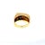 An elegant vintage ring crafted in solid 14k yellow gold, featuring a striking oval cat's eye chrysoberyl cabochon...