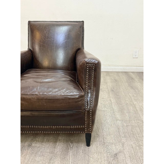 Beautiful pair of dark brown leather club chairs manufactured by Restoration Hardware in good condition