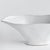 With a sculptural form and slim profile, this vase is made for narrow console or mantle. Drape a faux stem or two along...