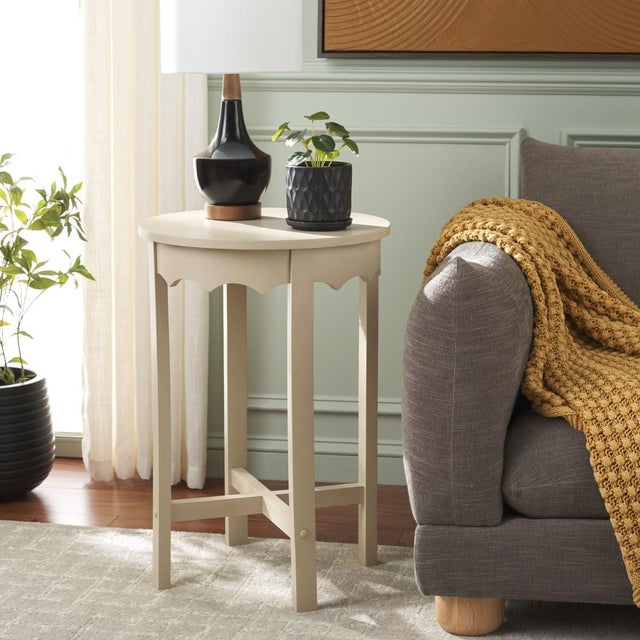 Discover the Seraphina Round Accent Table in a soothing Sand color, designed to enhance your living space with effortless...