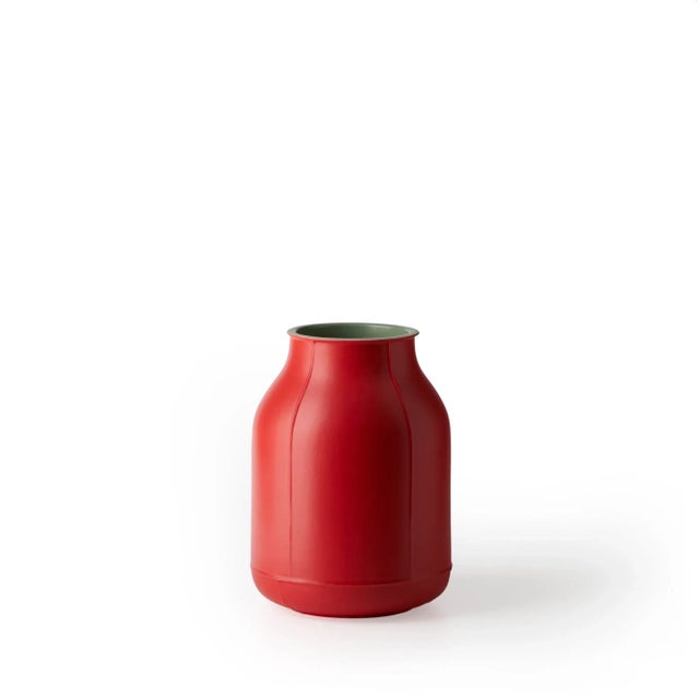 This large barrel vase was crafted in white earth and is made from matt red and green enamel. The collection is comprised...