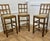 A Rare Trio of Arts and Crafts High Bar Stools, in Golden Oak A trio of early 20th century oak lattice back dining chairs,...
