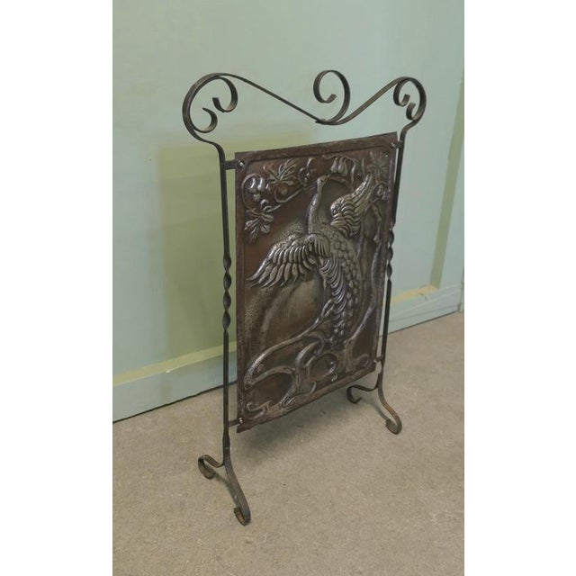 Arts and Crafts Peacock Design Polished Iron Fire Screen This is a Classic in the Arts and Crafts Style, it is a hand...