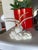 Elegant off-white seagull pair sculpture mounted on a textured cloud (rock) base. This item adds a coastal touch to any...