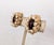 1950s goldtone oval cabochon faux-garnet with faux pearl dangles surround and filigree goldtone beads behind the faux-...