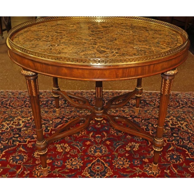 Maitland Smith French Louis XV Style Tessellated Marble Center Table Dimensions : 40" Wide X 40" Deep X 30" Tall This...