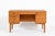 This vintage mid century Danish modern oak wood desk was made in Denmark circa 1960. The desk has a classic Scandinavian...