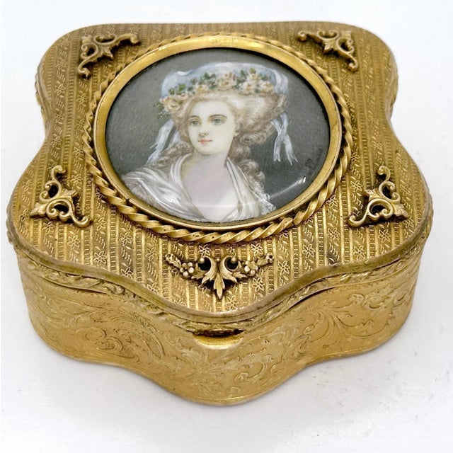 French Ormolu Cartouche Box with Miniature Portrait of Princess de Lamballe, Signed, Paris, circa 1900 This refined French...