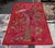 Design Plus Gallery presents an Indian Tapestry Artwork with Bead Embellishments. The fabric is a cherry red tone and has...