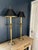Illuminate your space with this gorgeous pair of vintage brass buffet lamps with lucite bases. These mid-century modern...