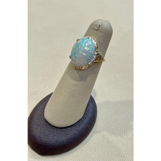 Metal 9 Carat Oval Shape Ethiopian Opal Cocktail Ring 14 Karat Yellow Gold For Sale - Image 7 of 18
