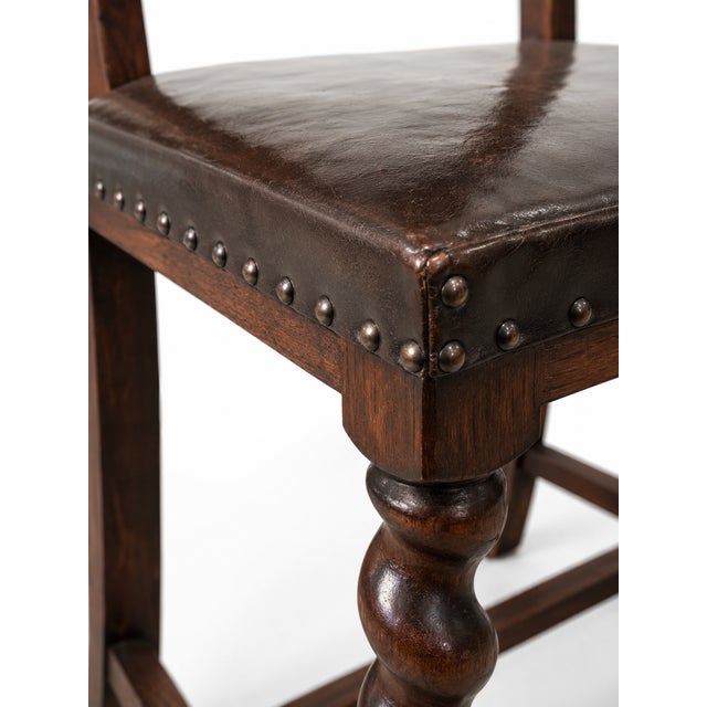 Elegant Cromwellian-style chair inspired by the austere English Commonwealth period of the 17th century. Featuring a solid...